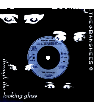 Through The Looking Glass Triple 7" Single Promo Front Cover - Click Here For Full Scan